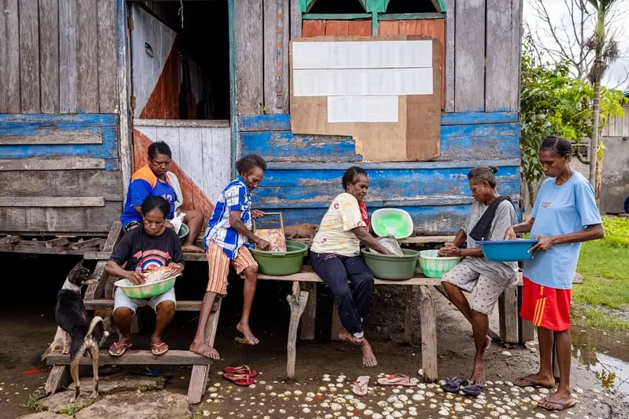 Family in a rural Papuan village
